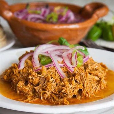  Cochinita Pibil: Thịt Heo Nướng Trên Lửa Hấp Dẫn, Cay Xực Vị Tropic Cực Ngon!